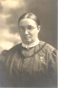 Sparks portrait with glasses (c. 1920s)
