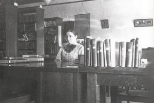 Sparks at the reference desk (smaller copy) 1916?